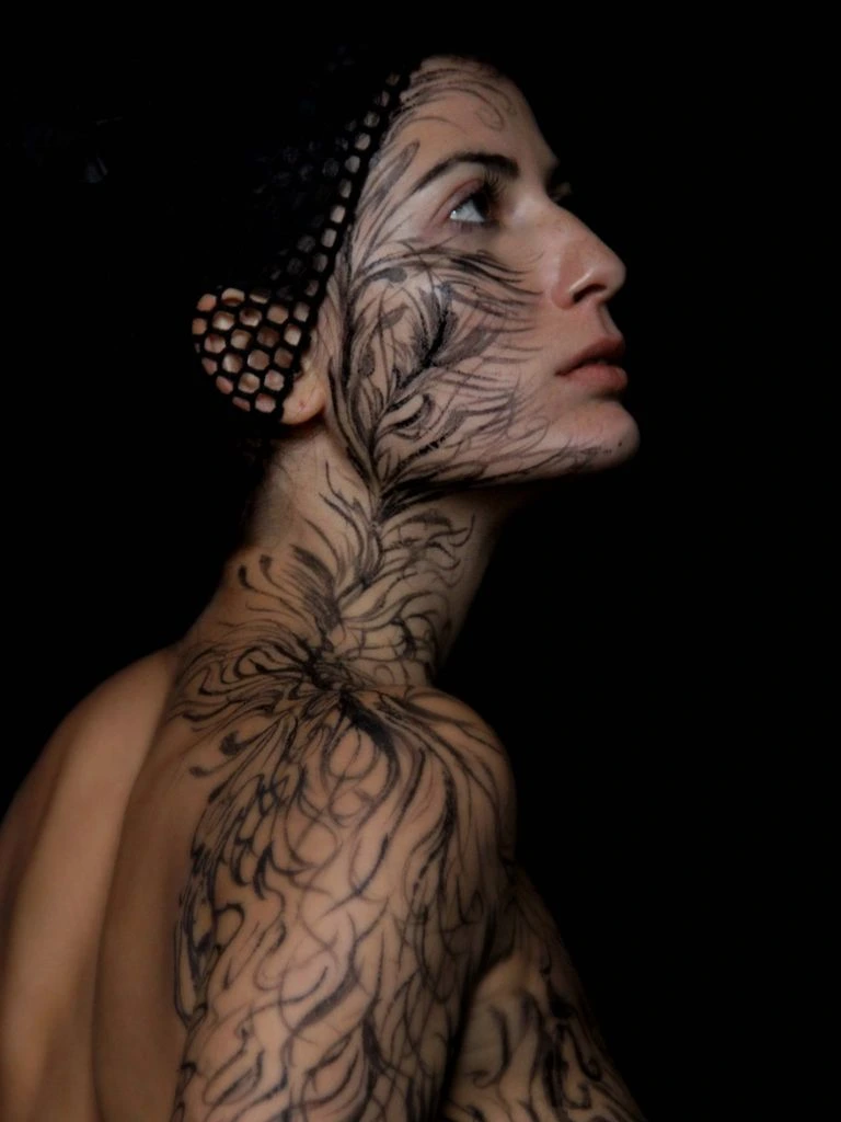 Sculptural ink-black draped dress